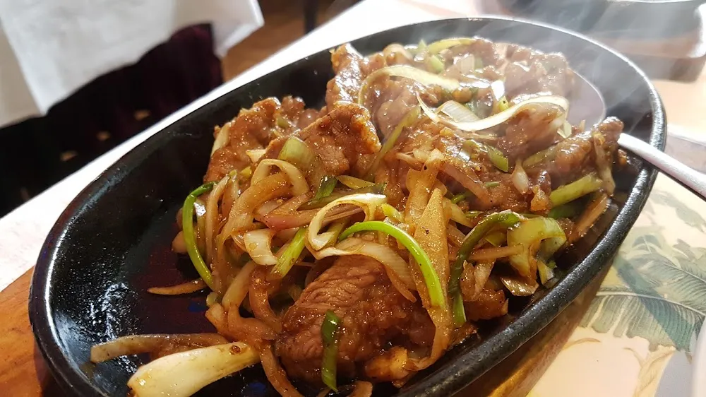 Sizzling Plate Pork with Ginger and Onion